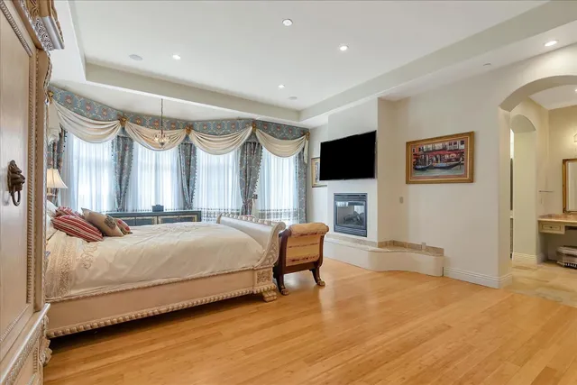 a living room with furniture a rug and white walls