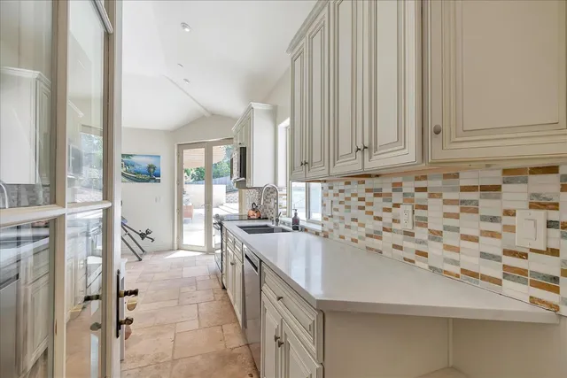 a view of a backyard of the house