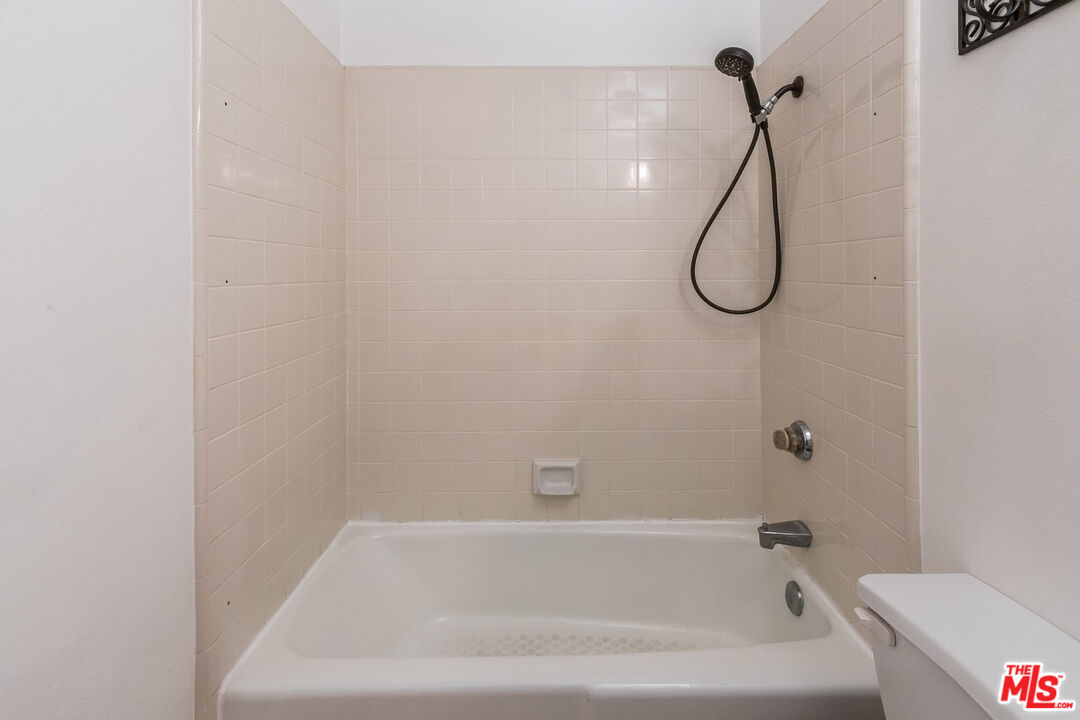 25 Hurricane Street, Unit 3 Marina del Rey, CA 90292 - Photo 12 of 27 a bathroom with a bath tub with a shower