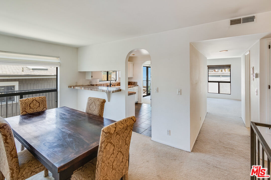 25 Hurricane Street, Unit 3 Marina del Rey, CA 90292 - Photo 2 of 27 a living room with furniture and a fireplace