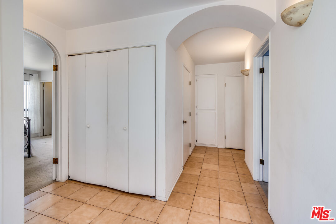 25 Hurricane Street, Unit 3 Marina del Rey, CA 90292 - Photo 7 of 27 a view of a room with white doors