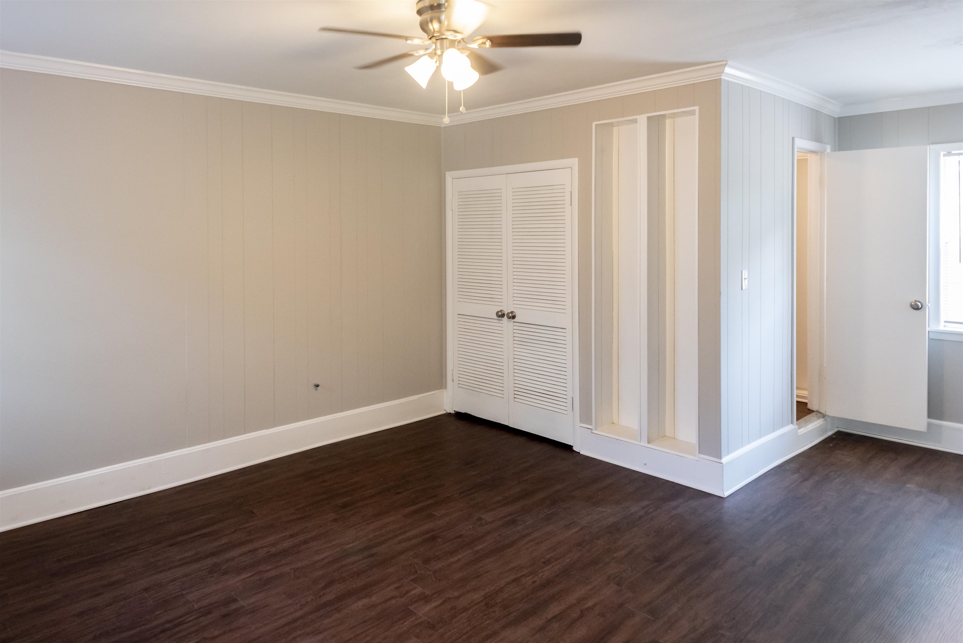 4622 Applegate Road Memphis, TN 38109 - Photo 13 of 13 a view of an empty room with wooden floor