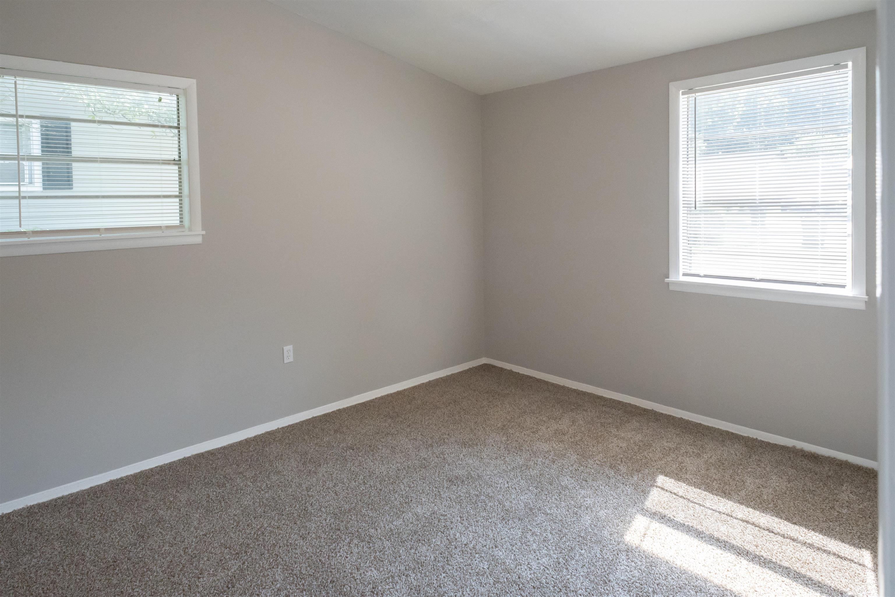 4622 Applegate Road Memphis, TN 38109 - Photo 3 of 13 an empty room with a window