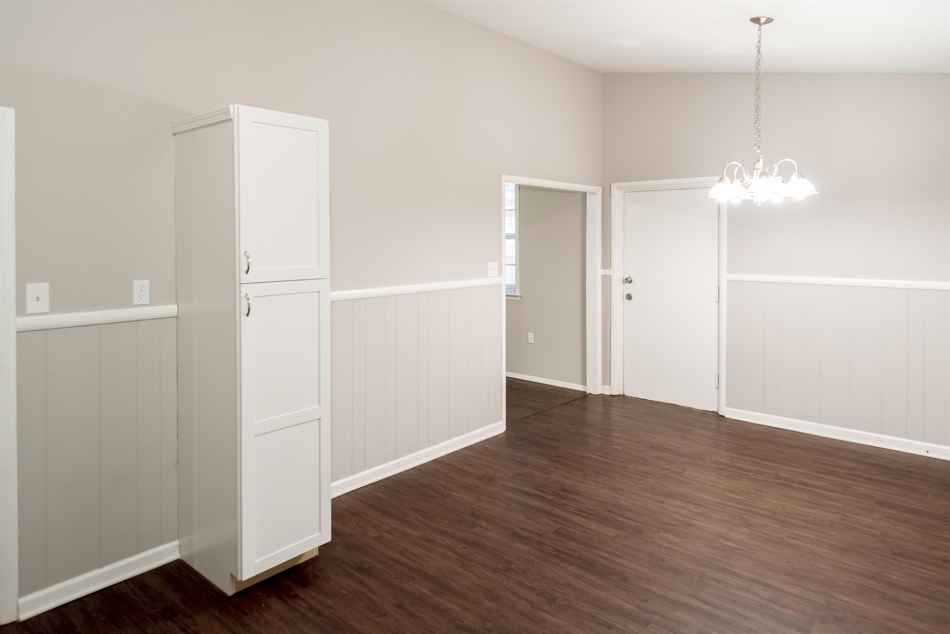 4622 Applegate Road Memphis, TN 38109 - Photo 9 of 13 an empty room with wooden floor