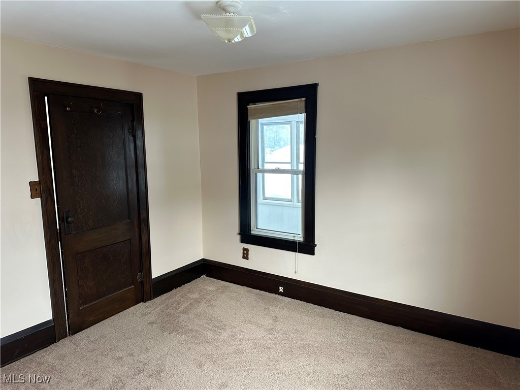 60 Taylor Road Barberton, OH 44203 - Photo 14 of 35 View of carpeted first floor bedroom