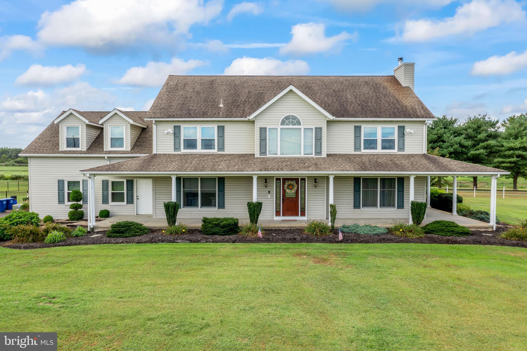 261 Red Lion Road Southampton, NJ 08088 - Photo 1 of 39 a front view of a house with garden