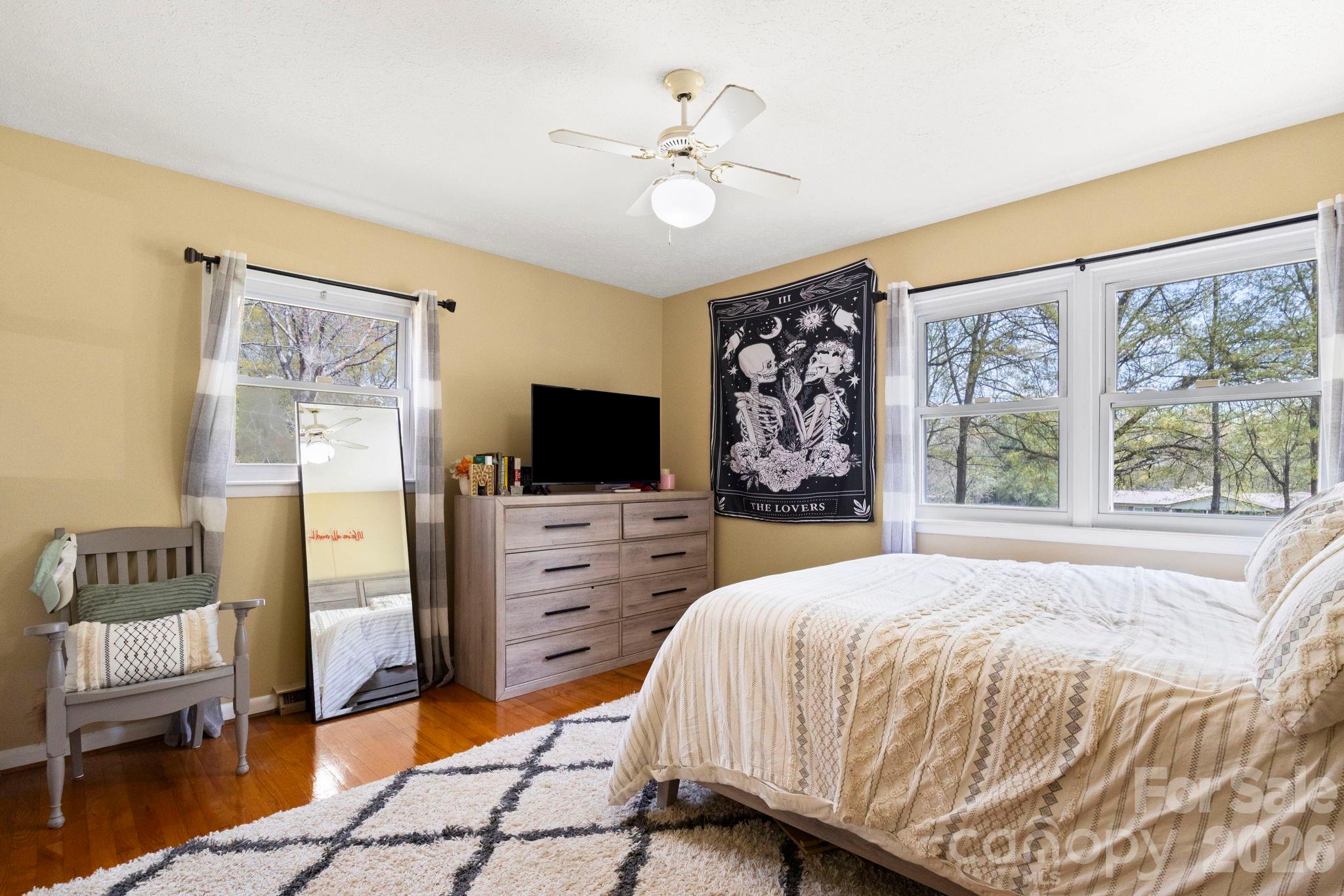 2200 Gaffney Road Shelby, NC 28152 - Photo 20 of 46 a bedroom with a bed and a flat screen tv