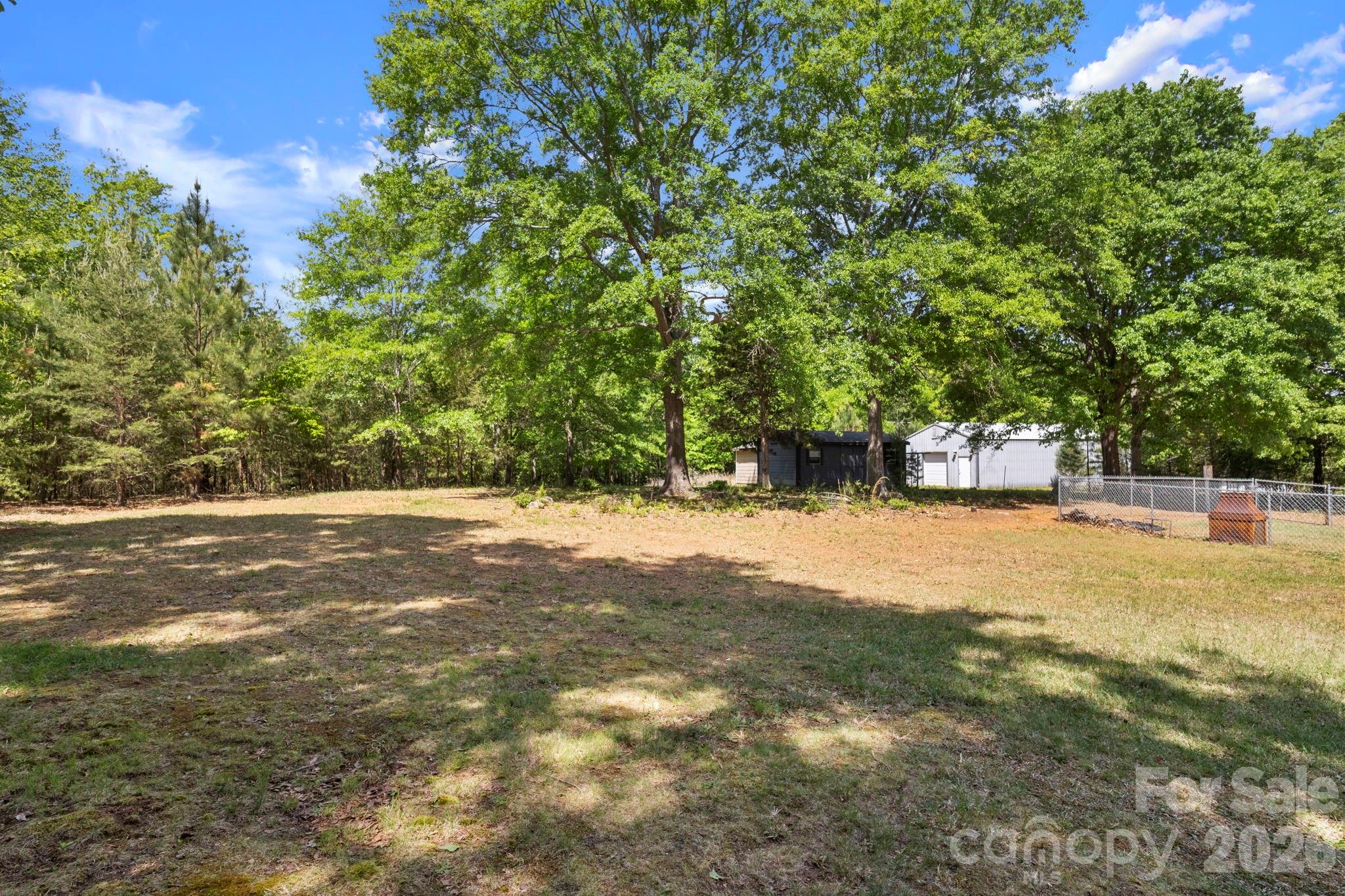 2200 Gaffney Road Shelby, NC 28152 - Photo 27 of 46 a view of a yard with a tree