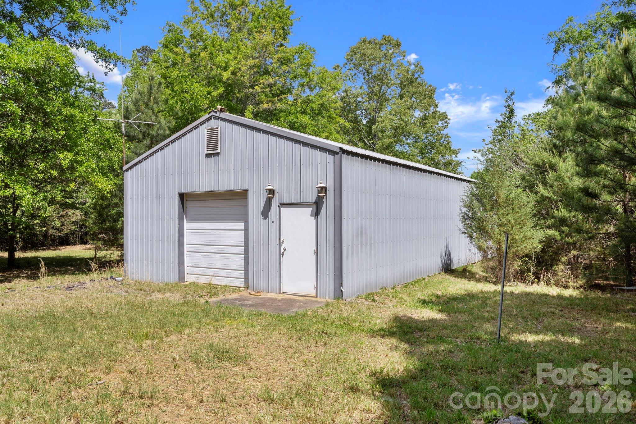 2200 Gaffney Road Shelby, NC 28152 - Photo 28 of 46 a backyard of a house with table and chairs