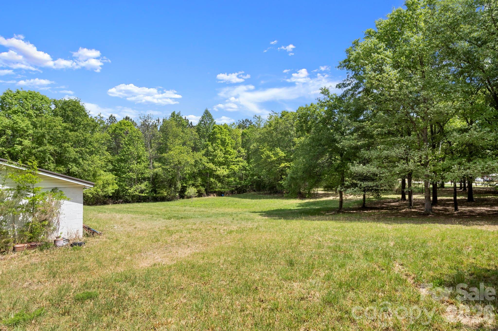 2200 Gaffney Road Shelby, NC 28152 - Photo 42 of 46 a view of a field of grass and trees