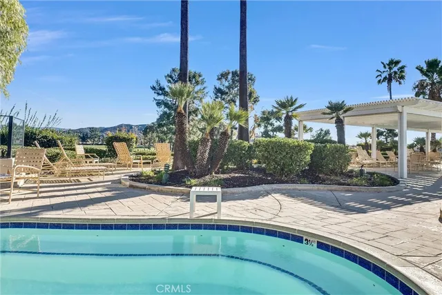 a view of a swimming pool and a terrace
