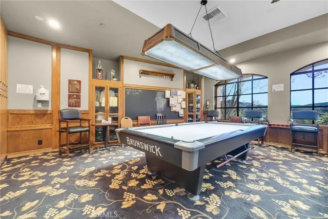 a room with furniture and a book shelf