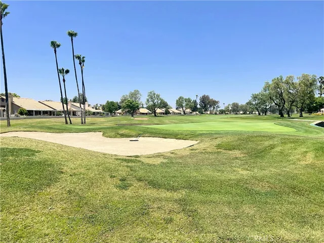a view of a lake with a big yard