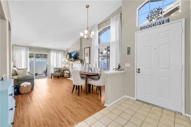 a view of a livingroom with furniture and hardwood floor