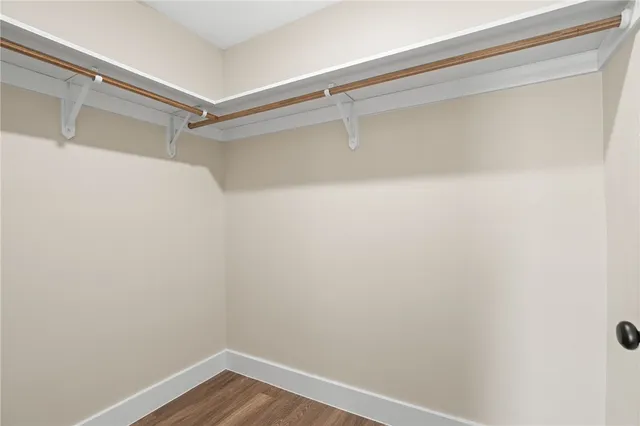 a view of a room with racks on the wall