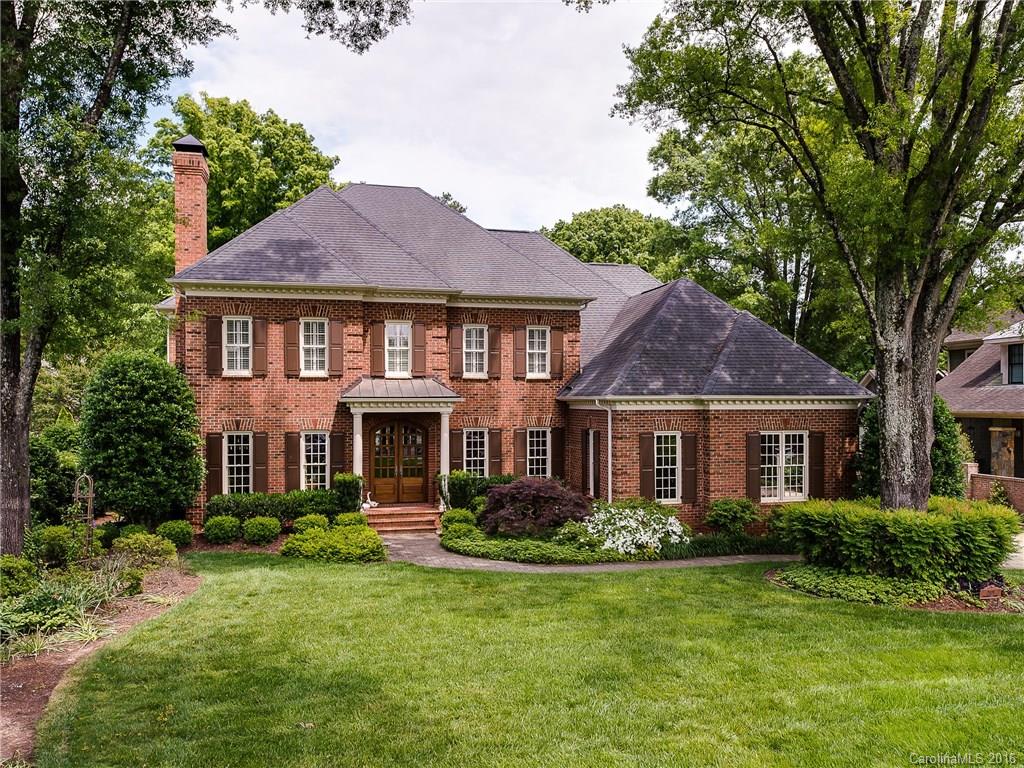 2419 Overhill Road Charlotte, NC 28211 - Photo 1 of 24 a front view of a house with a yard