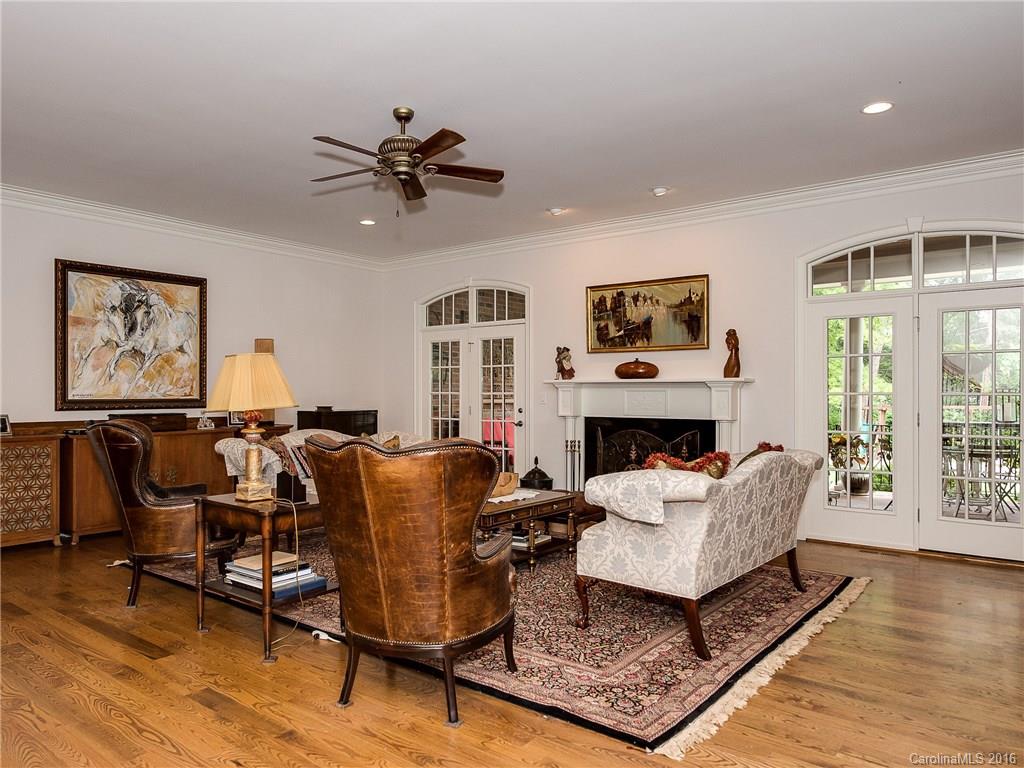 2419 Overhill Road Charlotte, NC 28211 - Photo 3 of 24 a living room with furniture a fireplace and a window