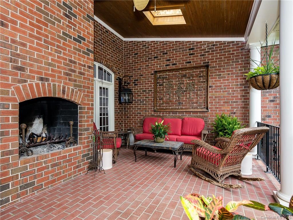2419 Overhill Road Charlotte, NC 28211 - Photo 21 of 24 a living room with furniture and a fireplace