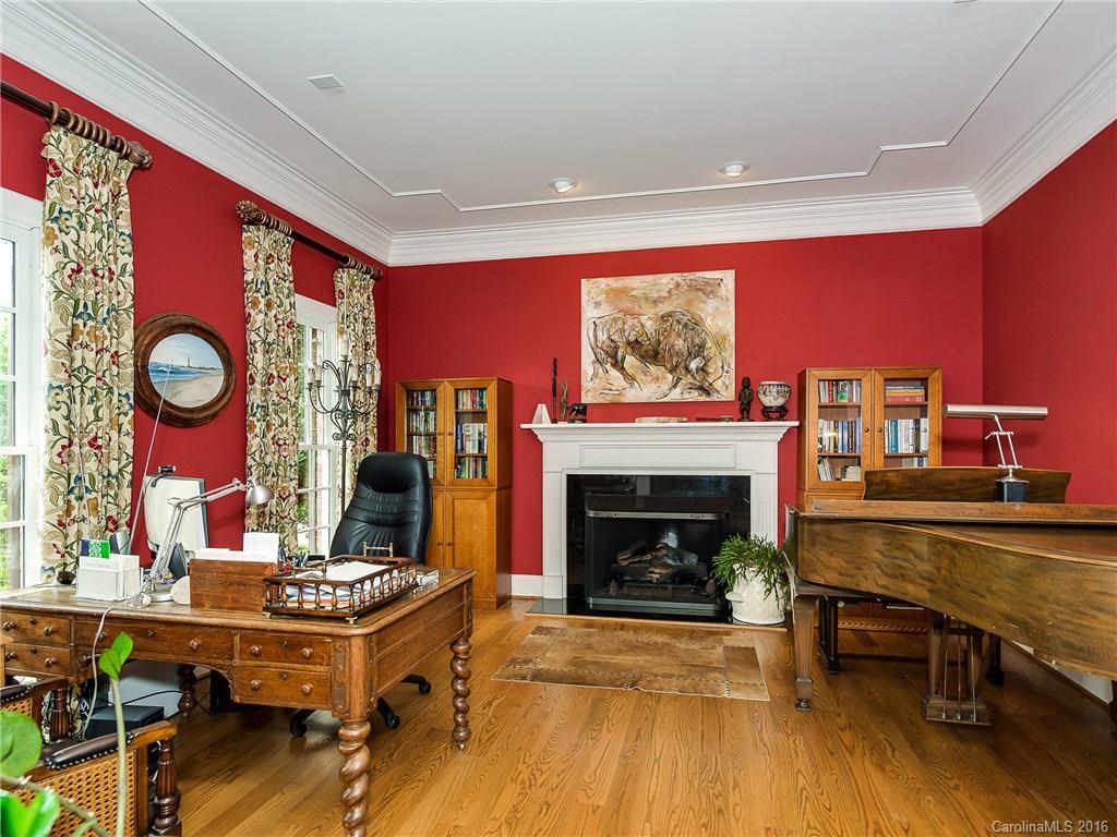 2419 Overhill Road Charlotte, NC 28211 - Photo 4 of 24 a living room with furniture and a fireplace