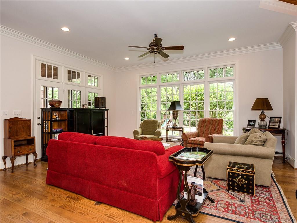 2419 Overhill Road Charlotte, NC 28211 - Photo 6 of 24 a bedroom with furniture and a large window