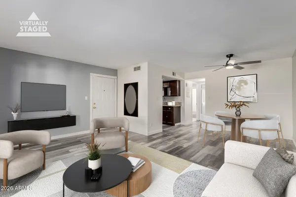 a view of empty room with a fireplace