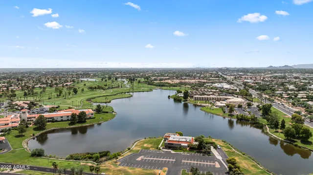 an aerial view of a house with outdoor space