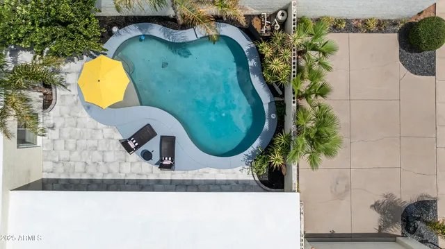 a bathroom with a sink and mirror