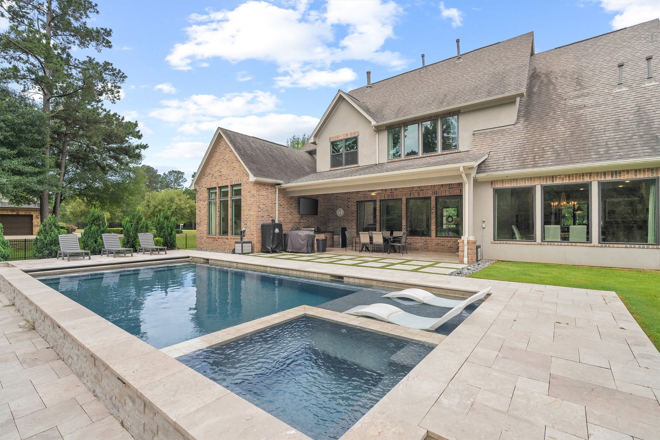 30702 Spring Lake Boulevard Tomball, TX 77375 - Photo 39 of 49 POOL is HEATED along with hot tub for year round enjoyment