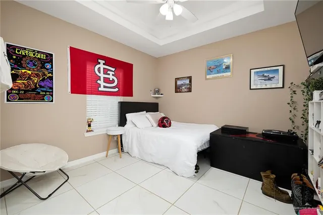 a bedroom with a bed and a furniture