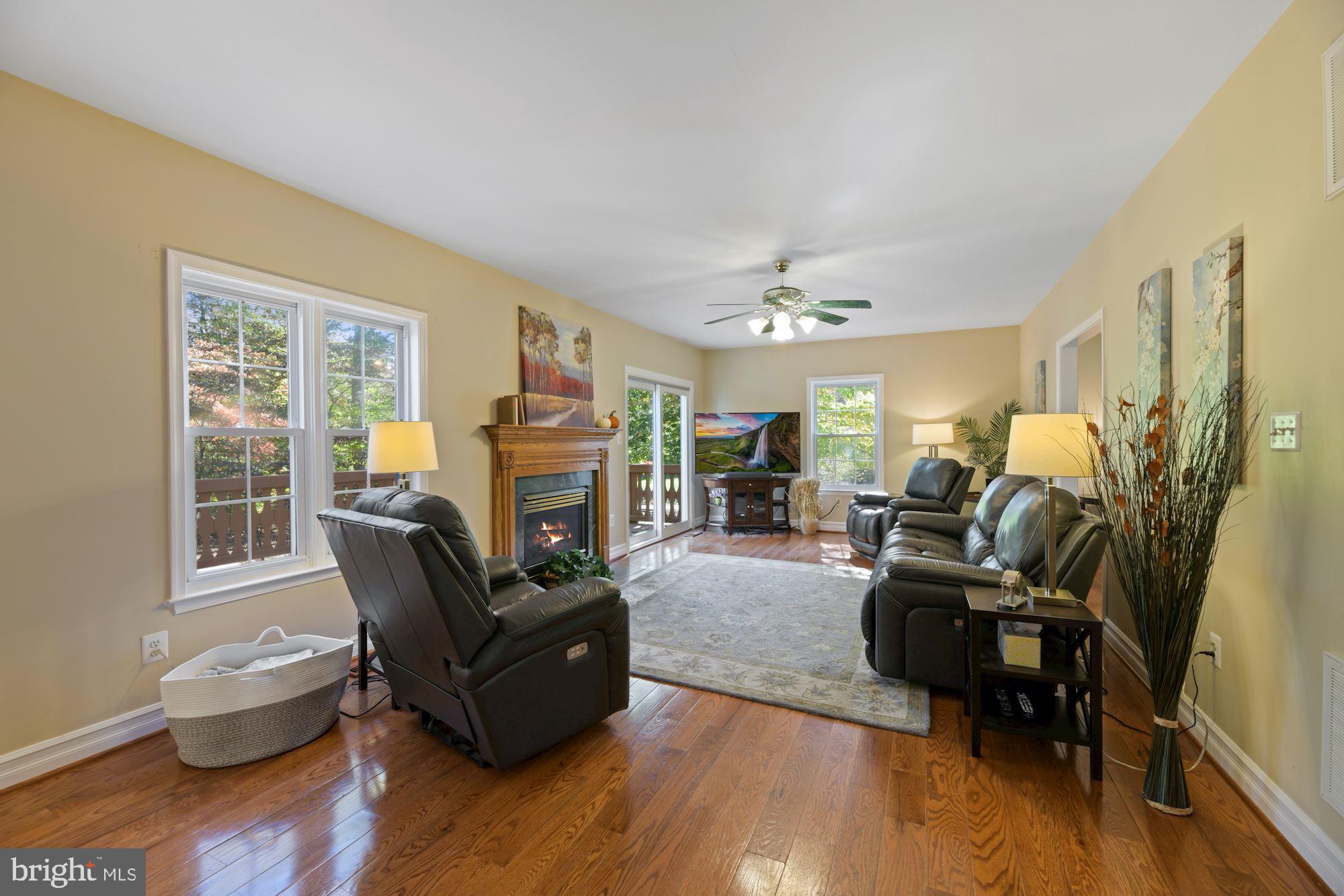 12121 Coloriver Road Manassas, VA 20112 - Photo 4 of 42 Gas fireplace in FR and walks out to huge deck