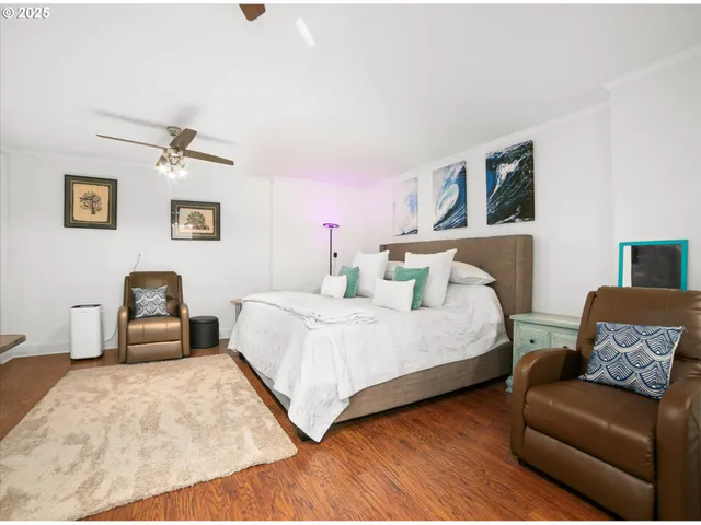 a bedroom with furniture and a bed