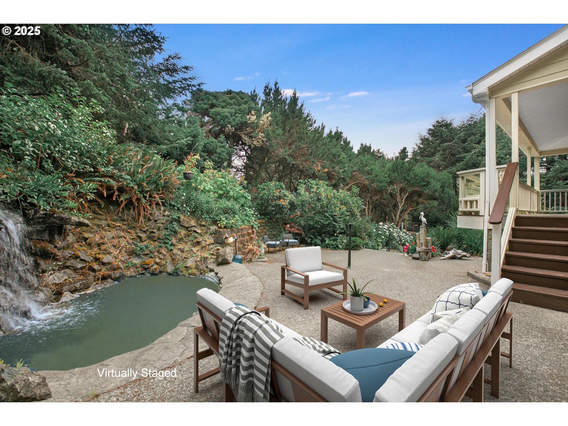 95161 Horizon Drive Gold Beach, OR 97444 - Photo 30 of 30 a view of a patio with table and chairs with wooden floor and fence