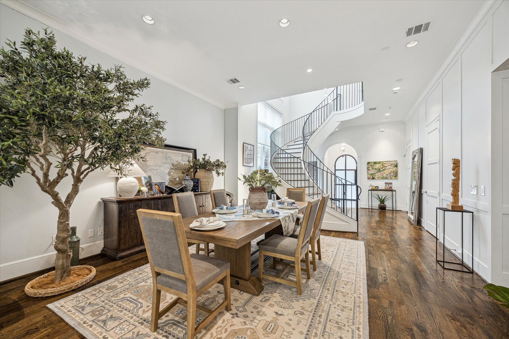 2501 Yupon Street Houston, TX 77006 - Photo 14 of 48 a dining room with furniture and wooden floor