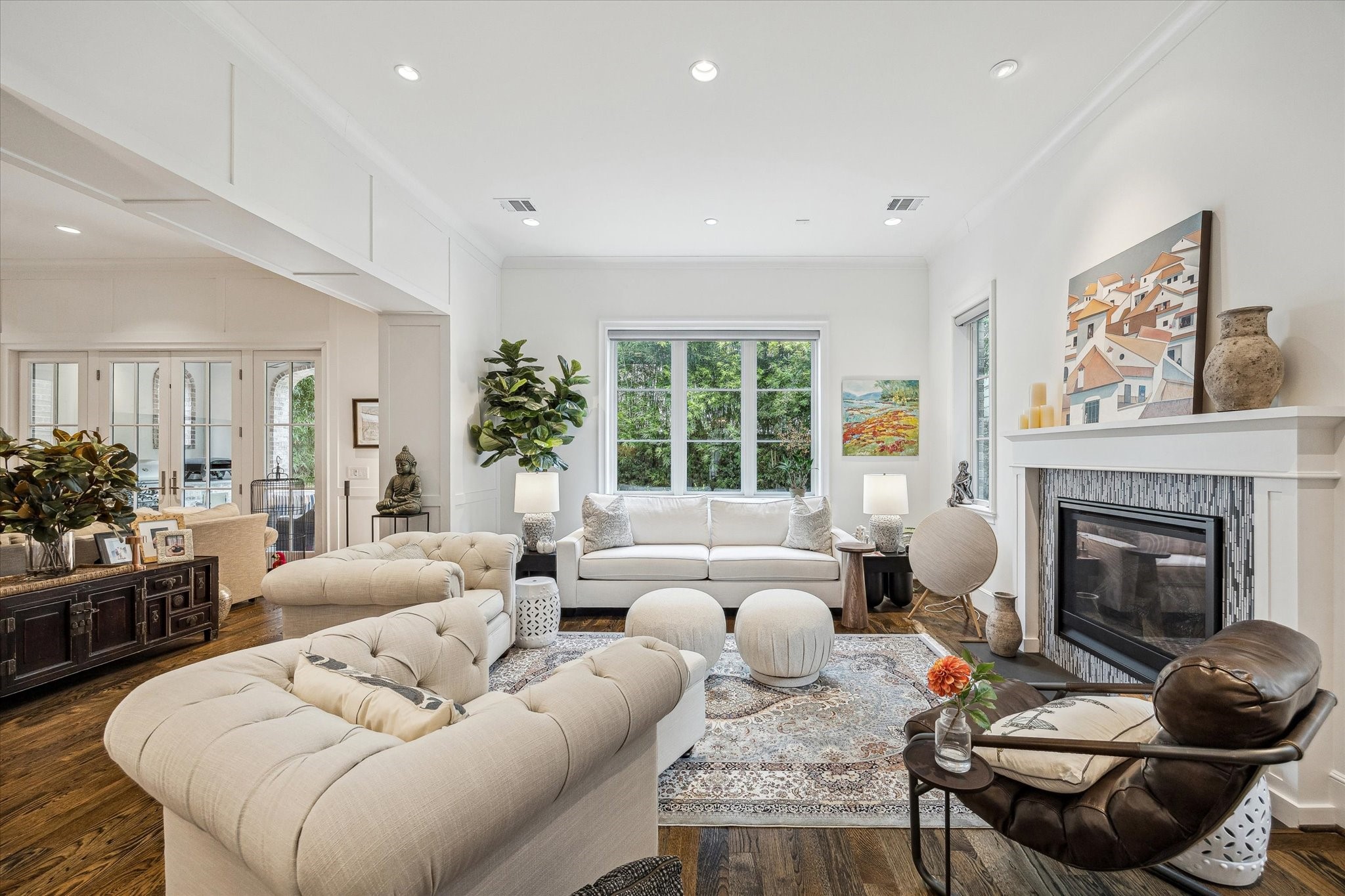 2501 Yupon Street Houston, TX 77006 - Photo 16 of 48 a living room with furniture and a fireplace