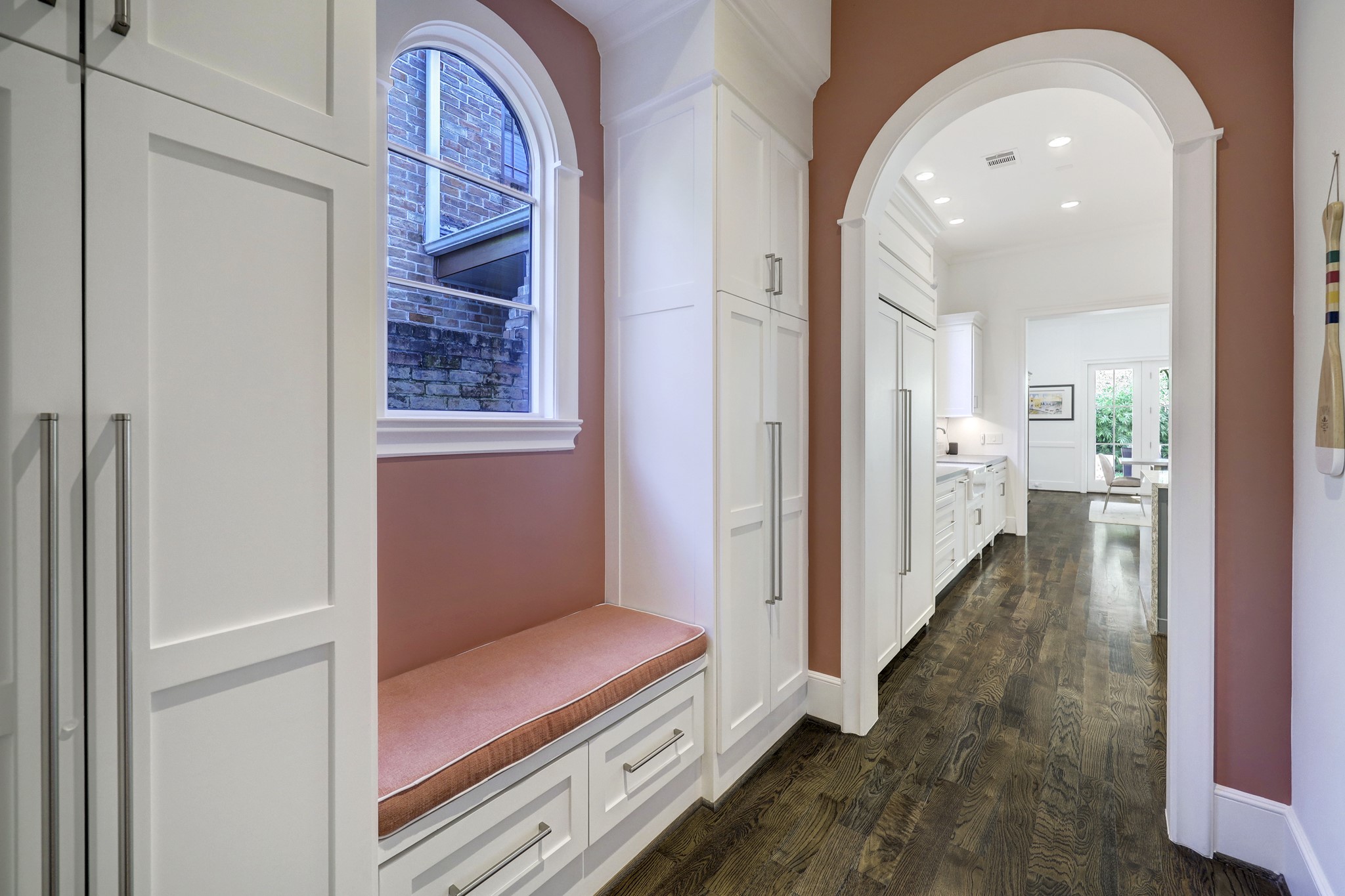 2501 Yupon Street Houston, TX 77006 - Photo 18 of 48 a view of a hallway with wooden floor and staircase