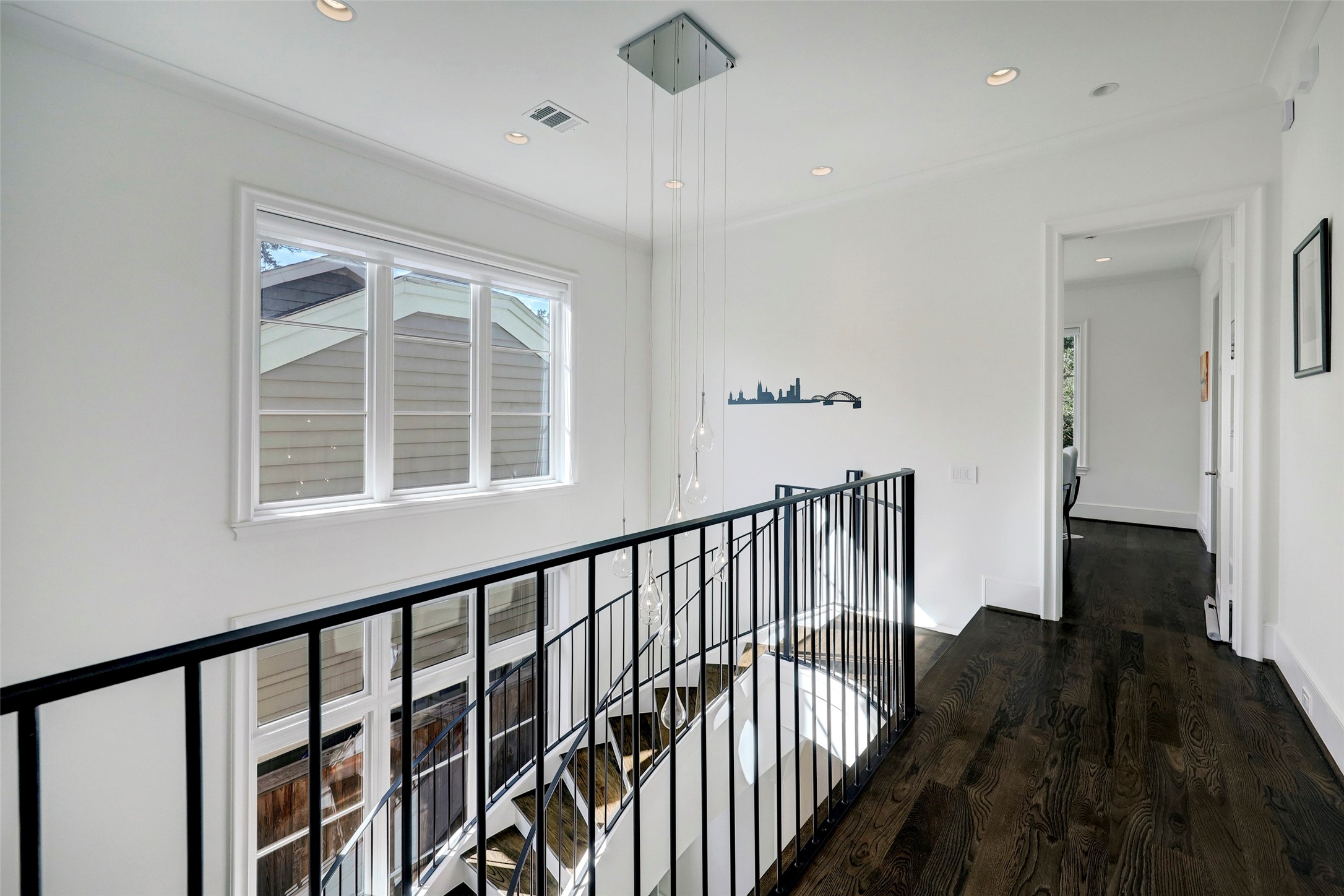 2501 Yupon Street Houston, TX 77006 - Photo 21 of 48 a view of staircase with railing and a window