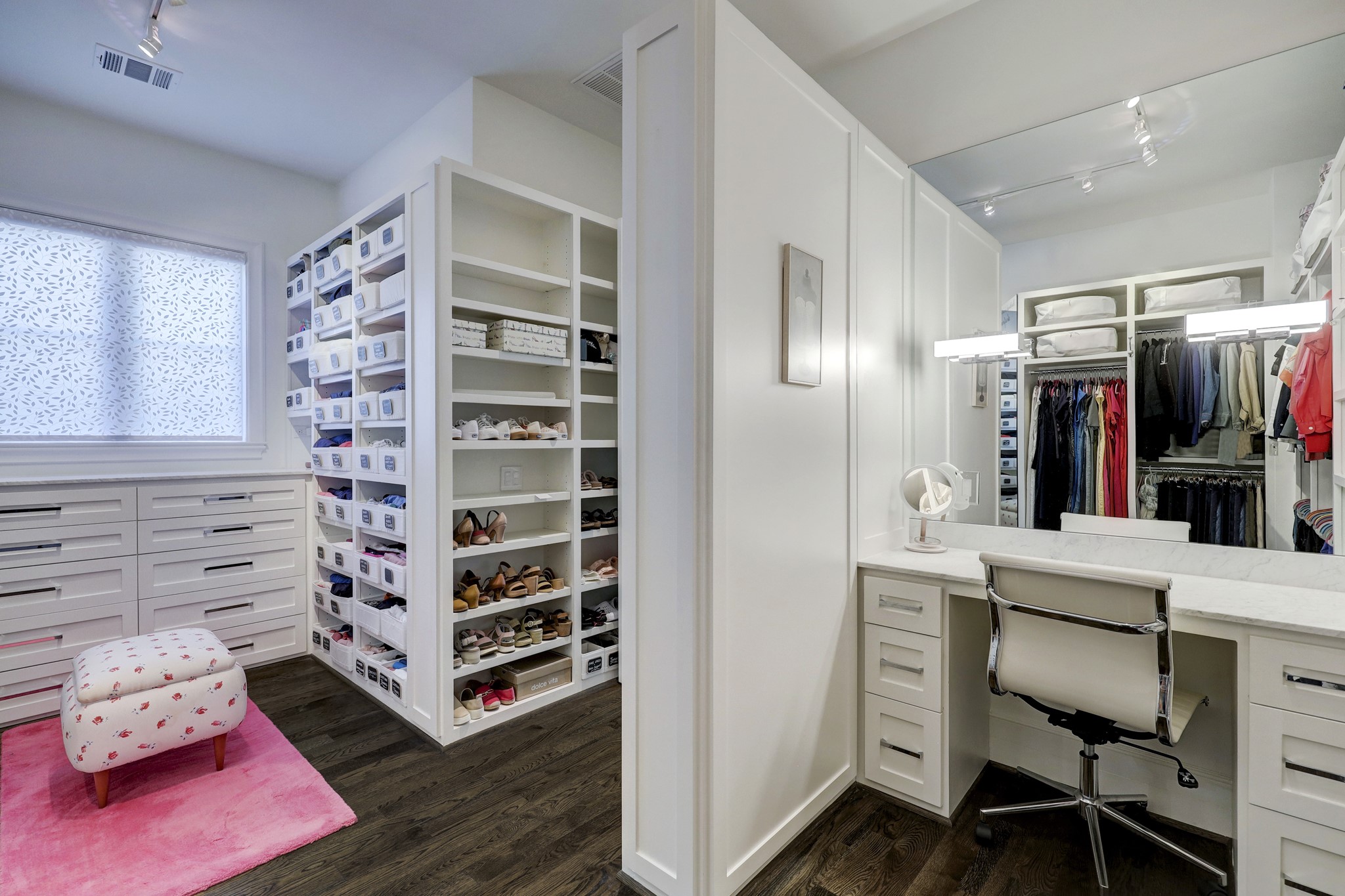 2501 Yupon Street Houston, TX 77006 - Photo 26 of 48 a view of walk in closet and wooden furniture