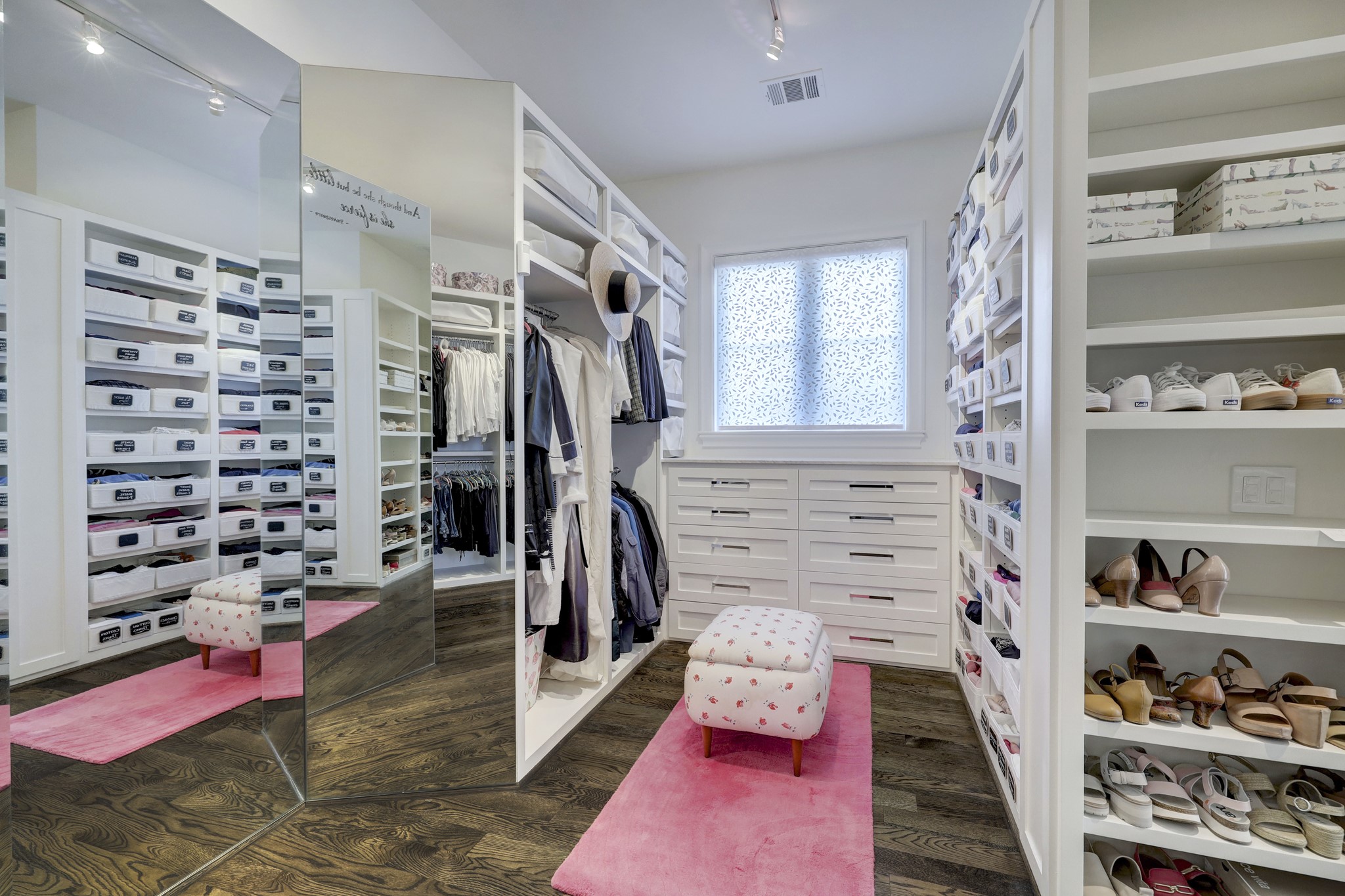 2501 Yupon Street Houston, TX 77006 - Photo 27 of 48 a view of walk in closet with clothes and shoes