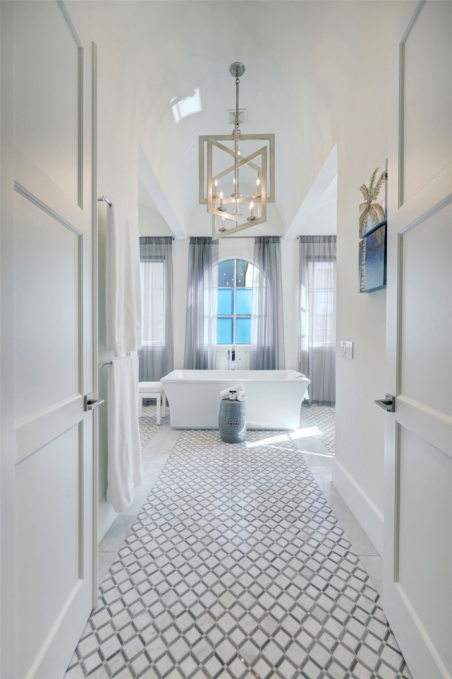 2501 Yupon Street Houston, TX 77006 - Photo 28 of 48 a living room with a couch and a chandelier