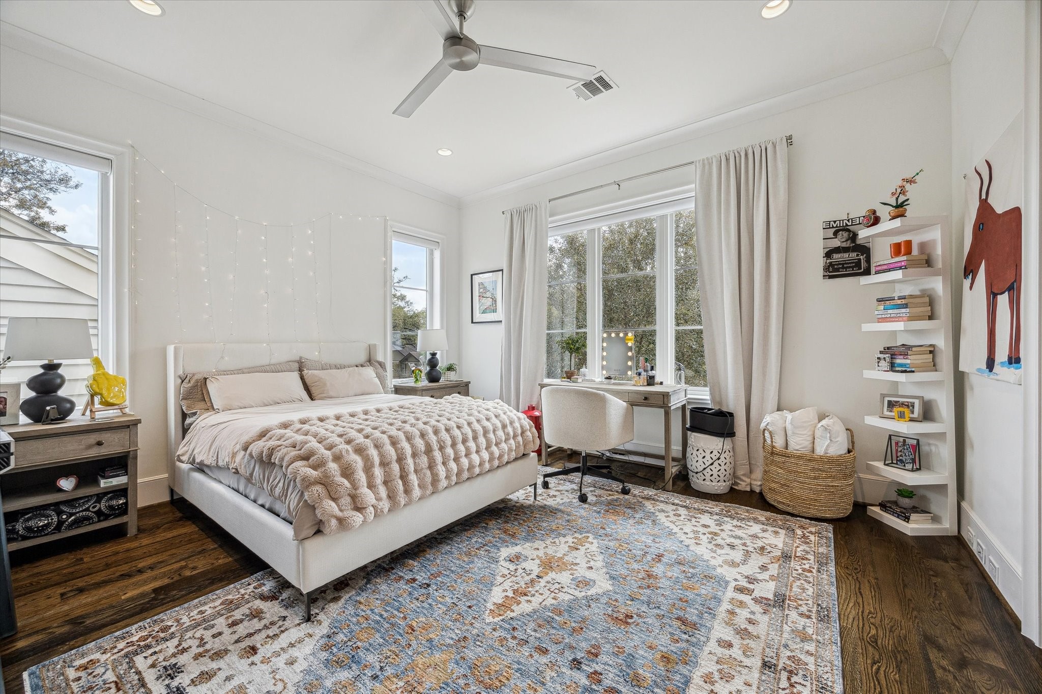 2501 Yupon Street Houston, TX 77006 - Photo 32 of 48 a bedroom with a bed and large windows