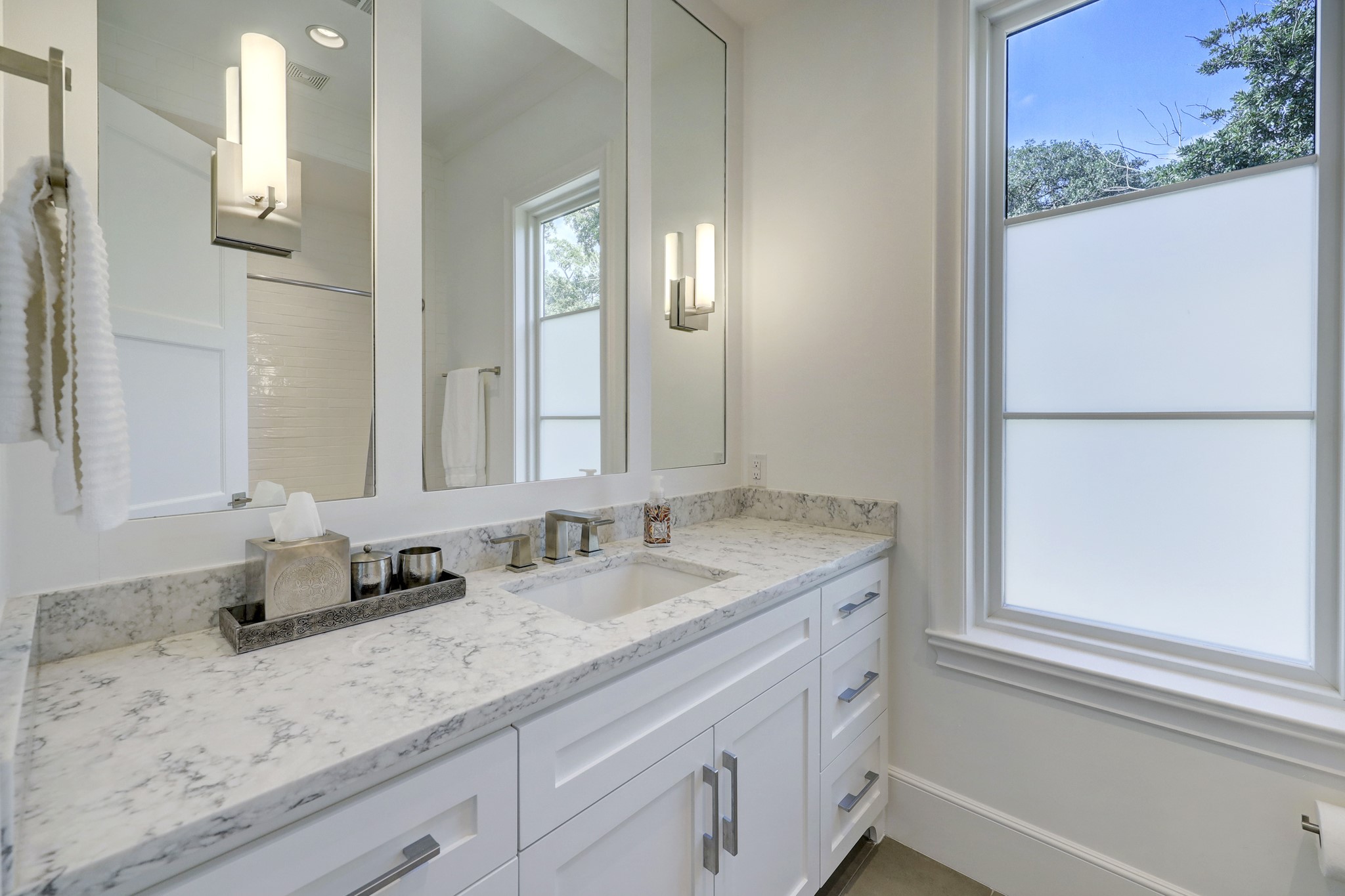 2501 Yupon Street Houston, TX 77006 - Photo 33 of 48 a bathroom with a granite countertop sink and a mirror