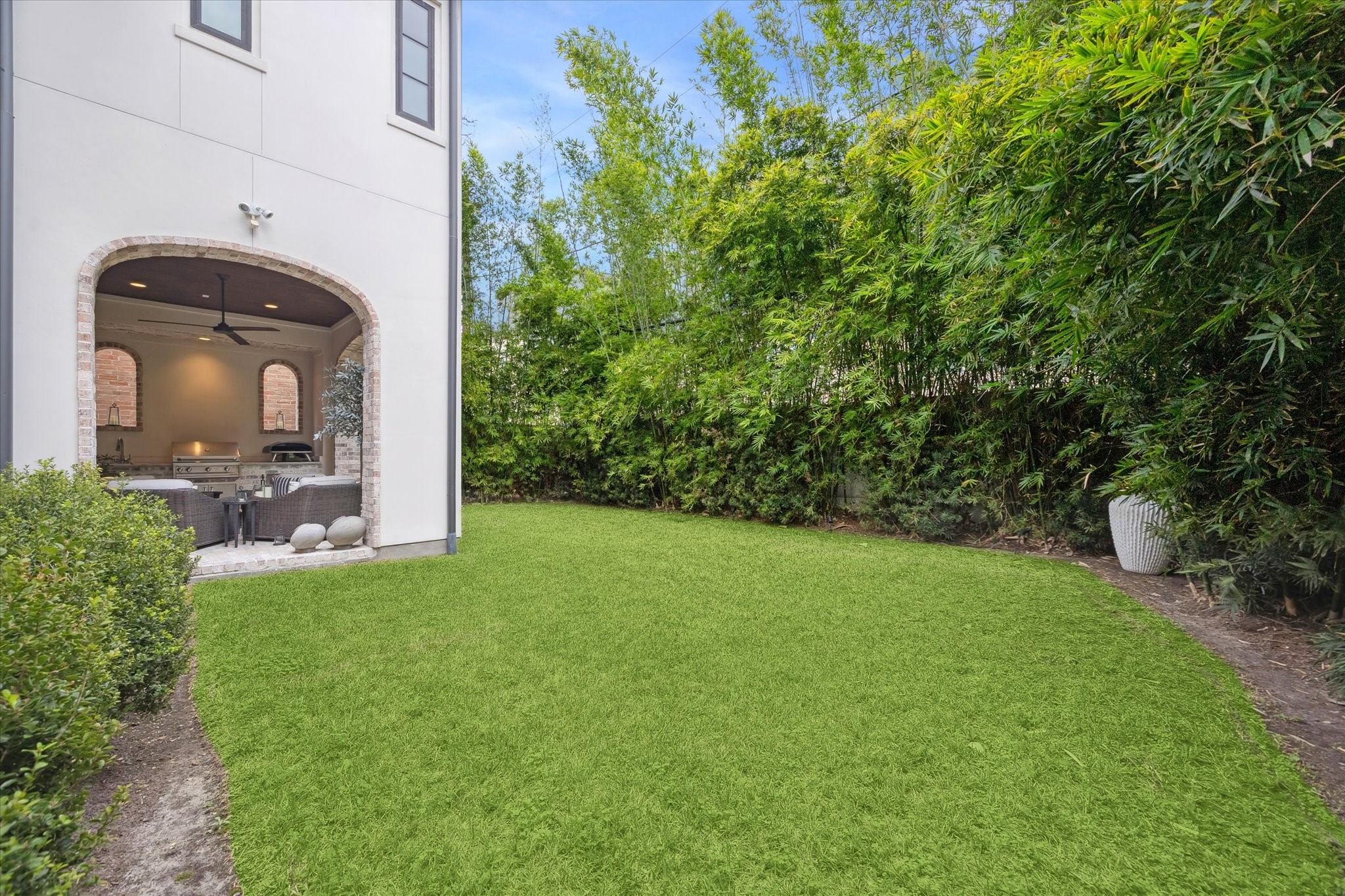 2501 Yupon Street Houston, TX 77006 - Photo 42 of 48 a view of a house with backyard and garden