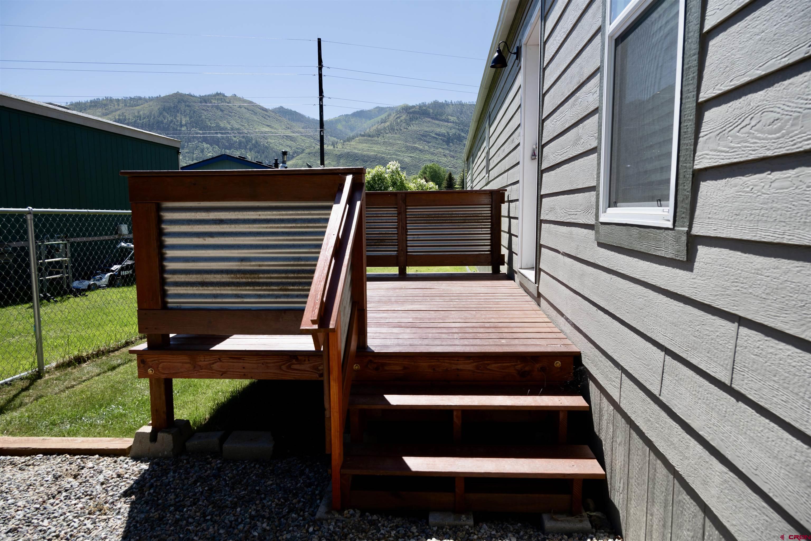 6000 County Road 203, Unit 44 Durango, CO 81301 - Photo 20 of 21 a view of a patio with a table and chairs