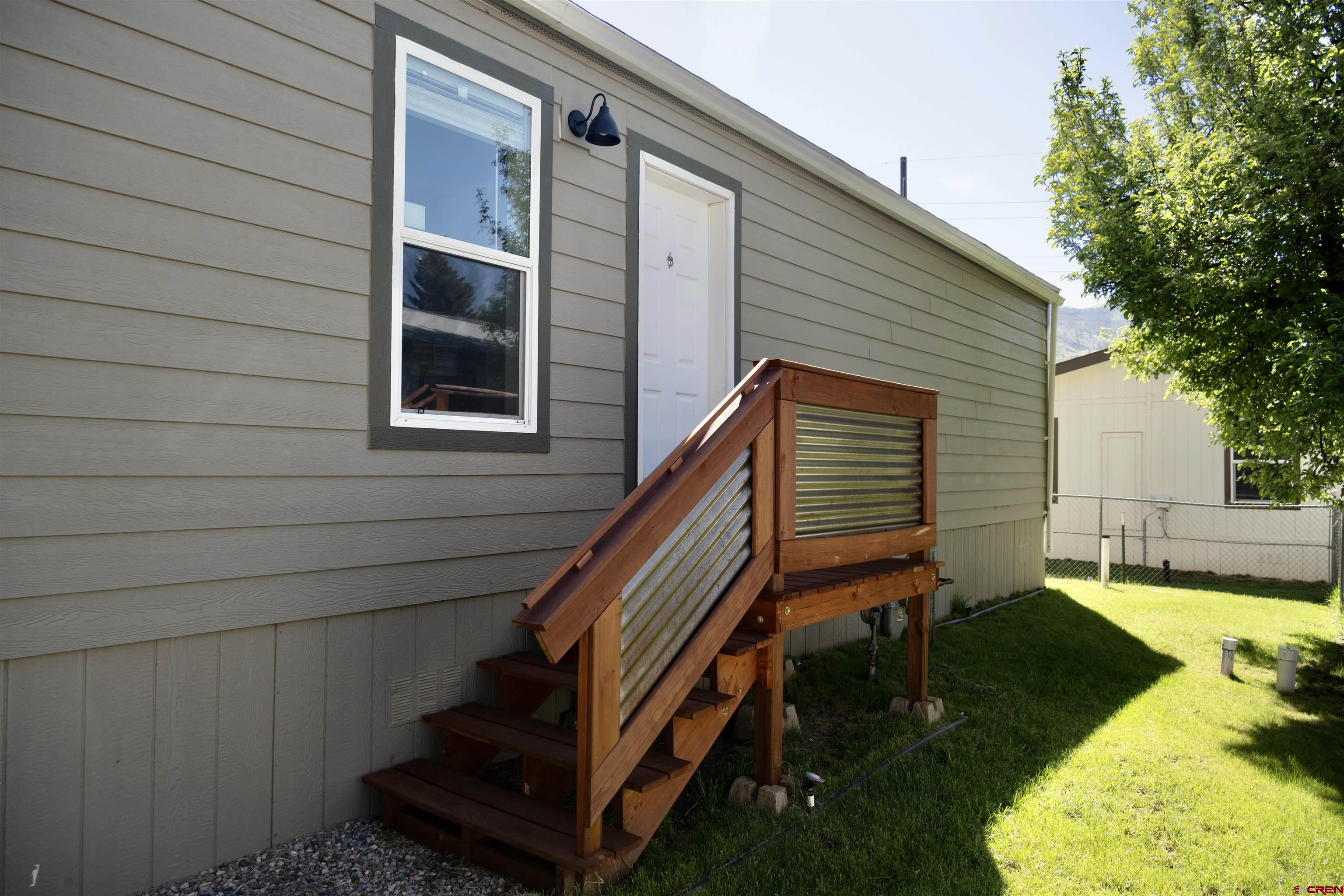 6000 County Road 203, Unit 44 Durango, CO 81301 - Photo 3 of 21 a backyard of a house with seating space