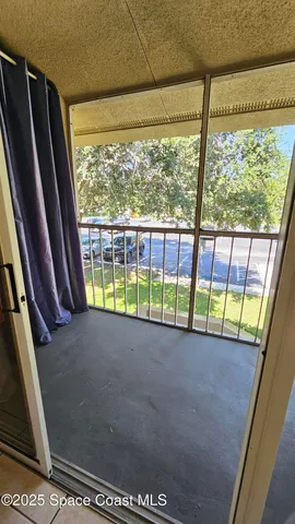 a view of a room with a window