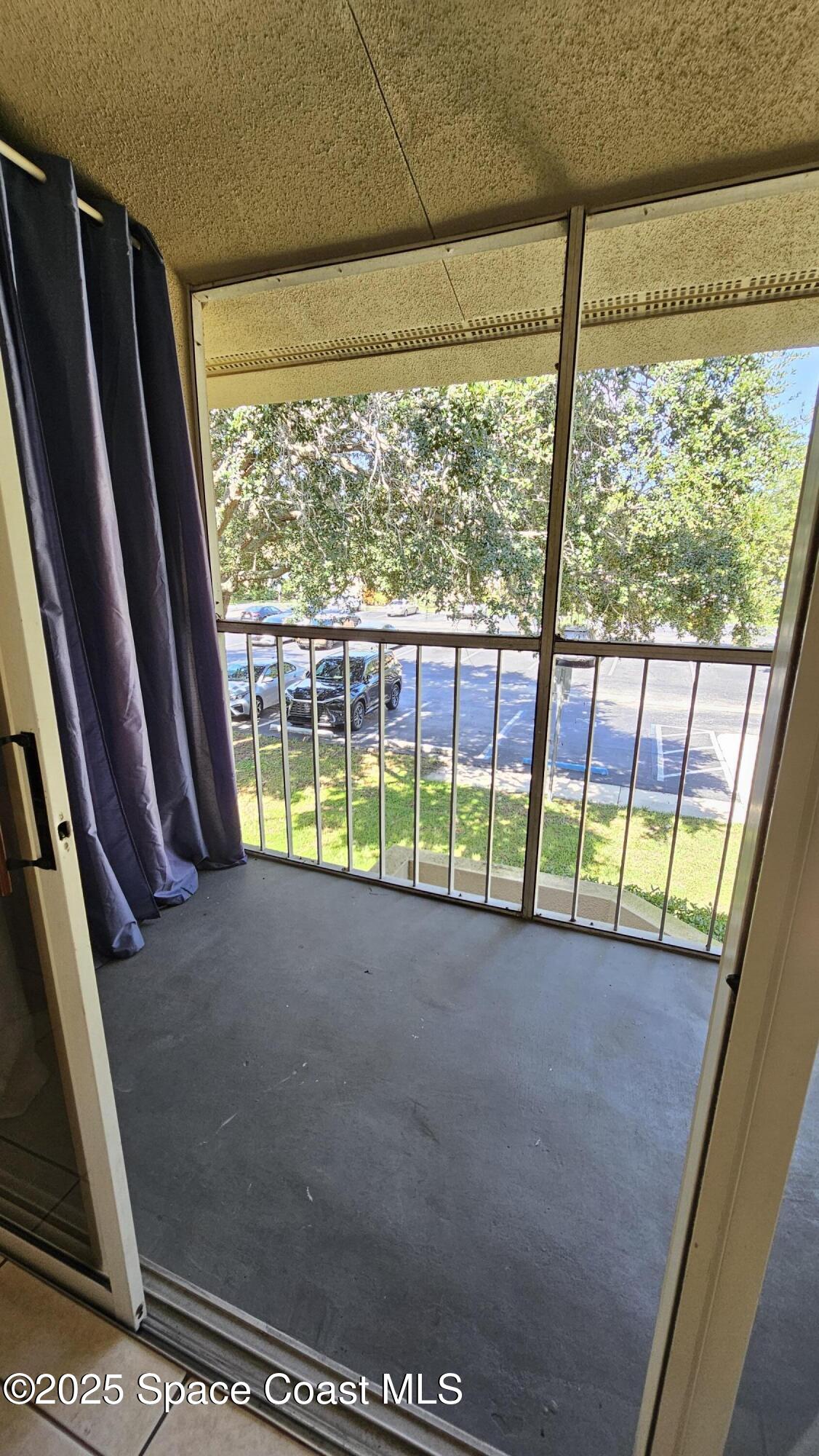 1641 Sunny Brook Lane, Unit C201 Palm Bay, FL 32905 - Photo 13 of 19 a view of a room with a window