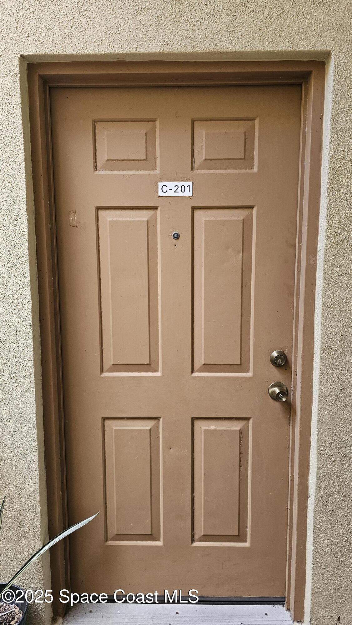 1641 Sunny Brook Lane, Unit C201 Palm Bay, FL 32905 - Photo 4 of 19 a view of front door