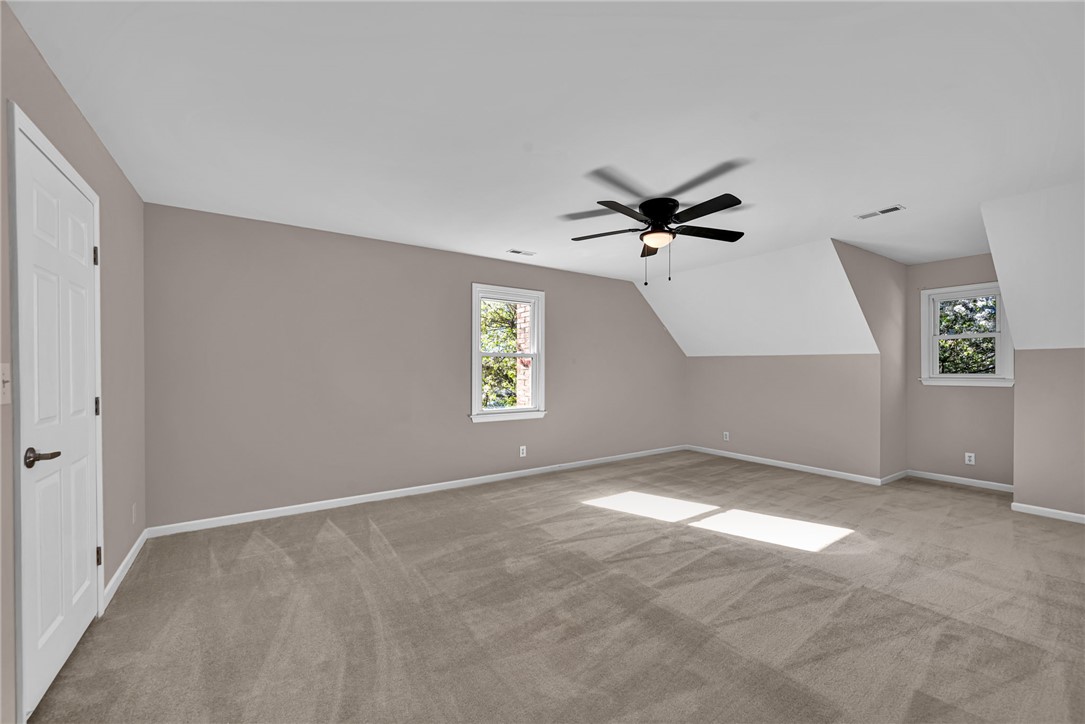 1509 Crestview Road Easley, SC 29642 - Photo 23 of 31 This spacious bedroom offers ample natural light and a comfortable, inviting atmosphere.