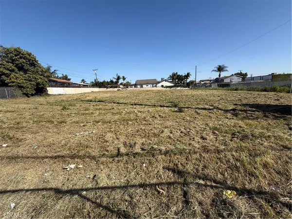 a view of a lake and a yard