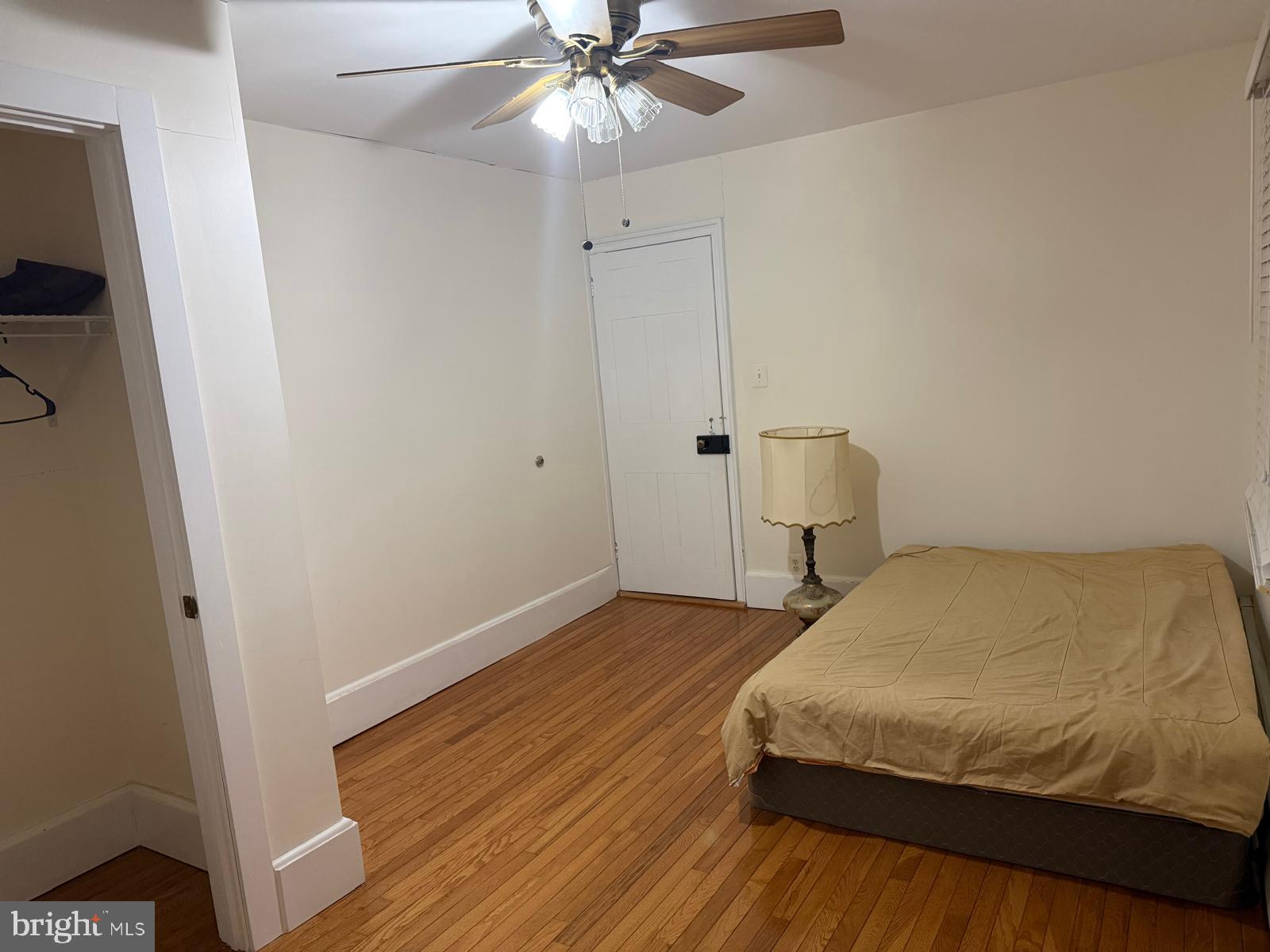 333 Etra Road Hightstown, NJ 08520 - Photo 10 of 16 a bedroom with a bed and a ceiling fan